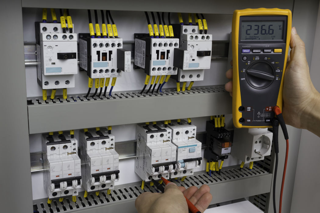 Barnet electrician inspecting a consumer unit